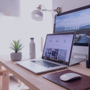 digital marketing agency in surat workspace with laptop,monitor and desk accesories