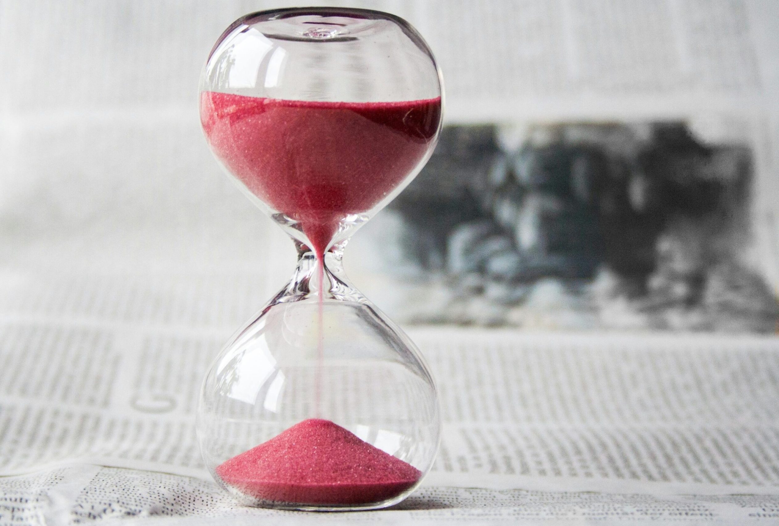 pexels-pixabay-39396 hourglass on snowy surface